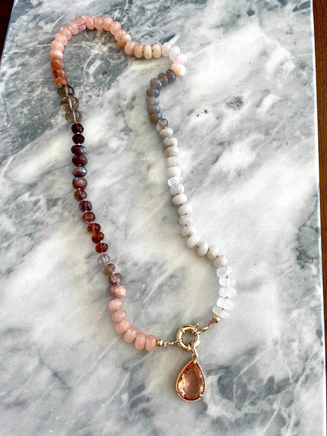 “After glow “knotted gemstone necklace