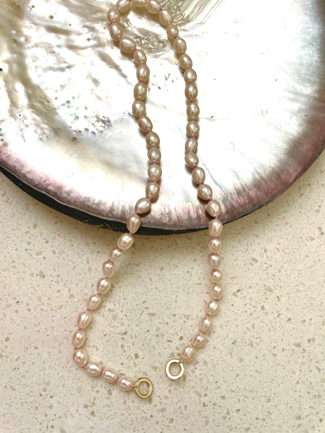 Freshwater pearl hand knotted necklace strand